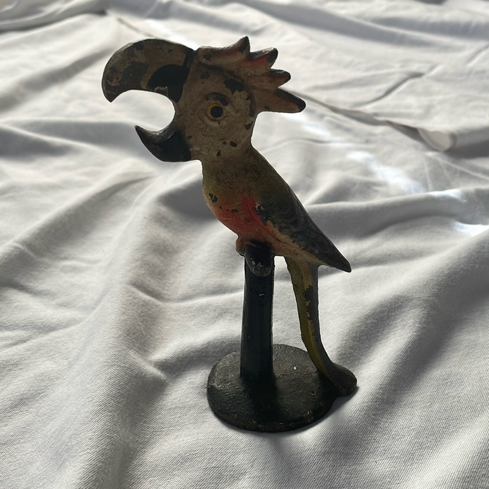 Vintage John Wright parrot or macaw bottle opener